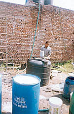 The drums being inspected during a raid by health officials at a plot in the factory area at Rajpura on Tuesday