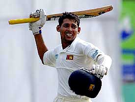 Sri Lanka's Tillakaratne Dilshan celebrates after reaching his century