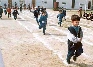 Tiny tots take part in a race at an inter-class sports meet of Ryan International School, Urban Estate, Ludhiana