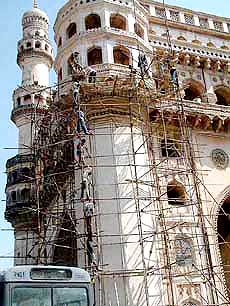 Restoration work by the Archeological Survey of India goes on at the historic Charminar