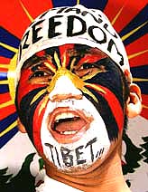 An activist of the Tibetan Youth Congress (TYC) shouts anti-China slogans 