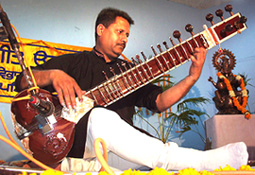 Harwinder Sharma plays the sitar at the Sangeet Utsav at Punjabi University in Patiala on Wednesday