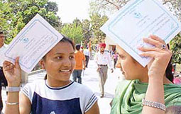 Bikram College of Commerce students with their certificates after the annual prize distribution function at the college in Patiala 