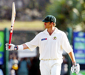 Australia's Matthew Hayden celebrates after reaching his century on the third day of the first Test in Galle