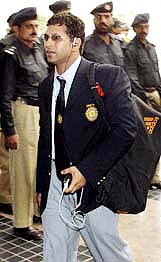 India's Sachin Tendulkar arrives amid tight security at a hotel in Lahore on Wednesday. 