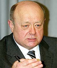 New Russian Prime Minister Mikhail Fradkov addresses a news conference in Moscow 