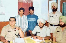 Police officials with the accused in the Vicky murder case