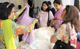 A Pakistan exhibitor on the last day of the Made in Pakistan exhibition at Talkatora Stadium in the Capital