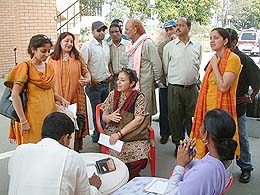 Theatre director Neelam Man Singh Chowdhry, along with members of her troupe at the Wagah joint checkpost on Thursday.