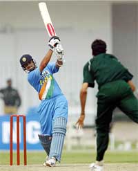 Rahul Dravid hits a shot off the bowling of Pakistan's Umar Gull during a warm-up match between India and Pakistan 'A'