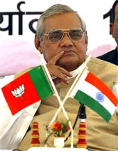 Prime Minister Atal Bihari Vajpayee sits at the condolence meeting of Sikander Bakht