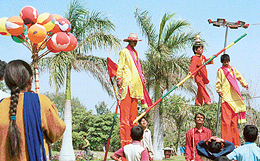 A girl artiste entertains visitors at Spring Fest in Panchkula on Sunday.