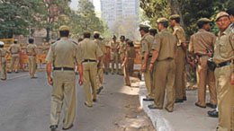 A fortified FCI building in the Capital, where DU teachers had converged on Sunday to voice their protest against the holding of an interview for the post of principal.