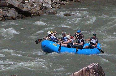 Participants at the International Rafting championship cruise along the Satluj river 