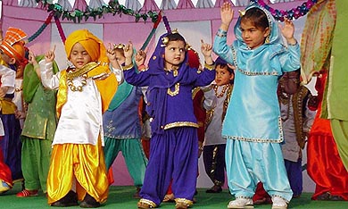 Kids perform bhangra on the occasion of joint annual day celebrations of Lovely Lotus and Chanda Mama Playway Schools at Ludhiana