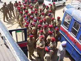 Punjab Police personnel arrive at the Polo Ground to beef up security in view of the Prime Minister's upcoming visit
