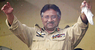 Pakistan President Gen Pervez Musharraf waves to the crowd