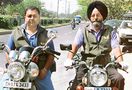 Mr Pradeep Chakravarty (left) and Mr Balbir Singh Saini, who will ride on motor cycles through the Attari-Wagah border into Pakistan for the Lahore One-Day International cricket match, left Chandigarh on Wednesday. 