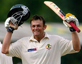 Australia's Adam Gilchrist celebrates reaching his century during the second day of the second Test against Sri Lanka at Asgiriya Sports Ground in Kandy 