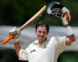 Australia's Damien Martyn celebrates after reaching his century on the third day of the second Test against Sri Lanka