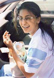 Bollywood actress Juhi Chawla is all smiles as she sits in a car in Chandigarh on Friday. She is in the city to shoot “Des Hoya Pardes” directed by Manoj Punj and is being made in both English and Hindi.