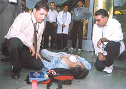 Apollo Hospital provided the first automated external defibrillator at Indira Gandhi International Airport. A live demonstration is in progress.