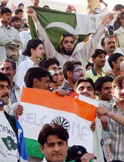 Indian and Pakistani cricket fans with their national flags