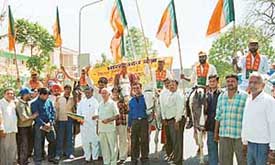 Workers of the city unit of the BJP take out a rally in connection with the forthcoming Lok Sabha elections in Chandigarh on Saturday.