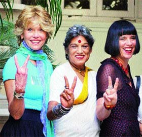 Hollywood actress Jane Fonda together with Indian television and theatre actress Dolly Thakore (centre) and playwright Eve Ensler, make a V-sign on International Women�s Day in Mumbai