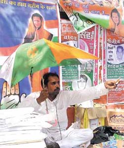 A street vendor sells the Congress merchandise, featuring the images of party president Sonia Gandhi outside the party headquarters as a run-up to the general elections to be held in five stages from April 20 to May 10, 2004