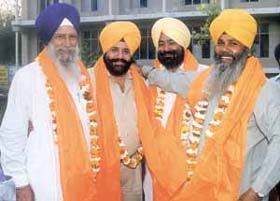 Newly elected president and general secretary of Delhi Sikh Gurdwara Employees Welfare Association S. Satnam Singh Koharka and S. Harbhajan Singh with DSGMC members S. Shamsher Singh Sandhu and GM S. Swaran Singh