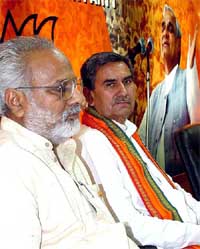 A former HVP leader from Bhiwani, Mr Om Parkash Singh Mann, who has joined the BJP, with party�s Haryana Pradesh president Ganeshi Lal at a Press conference in New Delhi 