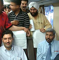 Visa hunters approach Pakistan visa officials in Amritsar on Saturday