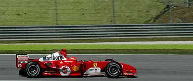 German world champion Michael Schumacher drives his Ferrari during a practice session in Malaysia 