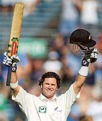 New Zealand's Chris Cairns celebrates his century 