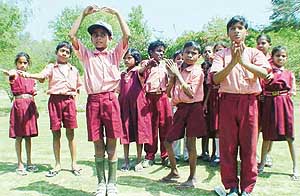 Slum children of Aasha School, Sector 25, Chandigarh, present a play to highlight the significance of afforestation during the World Forestry Day