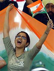 Ecstatic Indian supporters celebrate a great day of cricket in Lahore