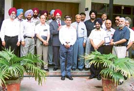 A team of Army officers from National Defence College with PAU Vice-Chancellor Dr K.S. Aulakh in Ludhiana