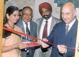 The Nepalese ambassador, Mr Karma Dhoj Adhikari, inaugurating the office of Everest Bank Ltd.,