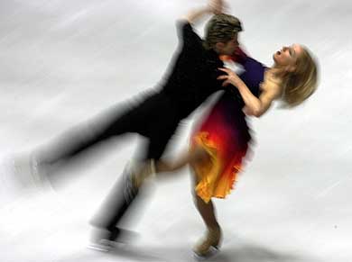 Great Britain's Sinead Kerr and John Kerr perform at the World Figure Skating championships in Dortmund