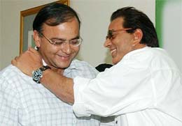 Veteran Bollywood actor Dharmendra with Union Law and Justice Minister Arun Jaitely after joining the BJP in New Delhi 