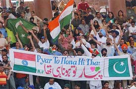 Fans from both India and Pakistan cheer their teams during the fifth and final ODI in Lahore on Wednesday
