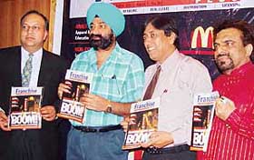 Mr Ritesh Arora, Mr Jaspal Bhatti, Mr Vinod Behl and Mr P. Khurrana launch Franchise Plus magazine at a hotel in Chandigarh 