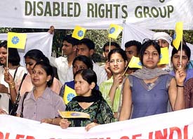 Activists of the Disabled Rights Group demonstrate to resolve their problems