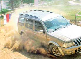 The Sports Utility Vehicle Ford Endeavour being driven at a specially laid dirt track at the opening of The Great Ford Drive