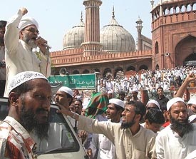 Imam of Jama Masjid Ahmed Bukhari addresses a protest rally in front of the Jama Masjid in old Delhi after the Friday prayers to commemorate the death of Hamas leader Sheik Ahmed Yassin. 