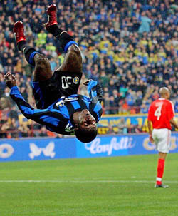 Inter Milan's Obafemi Martins of Nigeria celebrates after scoring against Benfica