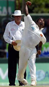 Sri Lankan off-spinner Muttiah Muralitharan bowls during the third Test against Australia 