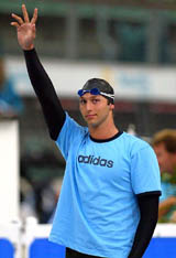 Ace Australian swimmer Ian Thorpe waves to spectators before the start of the men's 200-m freestyle final at the Australian Olympic team swimming trials in Sydney 