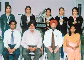 Athletes of the GNIMT, Ludhiana, who have won overall championship for the third consecutive year in the 7th annual athletics meet of Punjab Technical University held at Fatehgarh Sahib recently